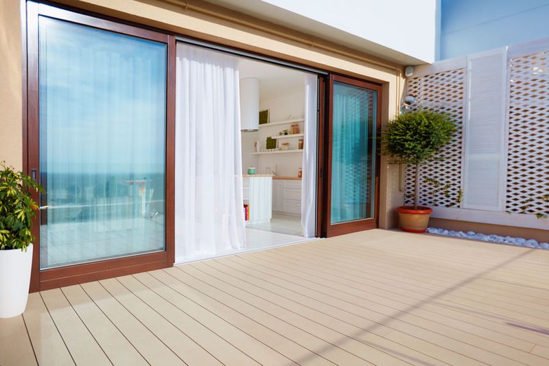 homeguide large oversized wood sliding glass doors leading to Patio/Sliding Door 1